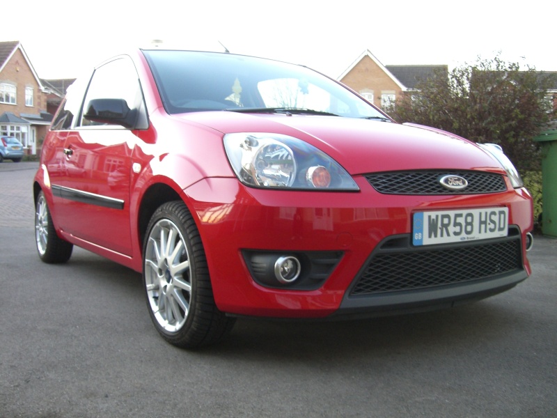 Its a Ford Fiesta MK6 30th Anniversary Red Edition